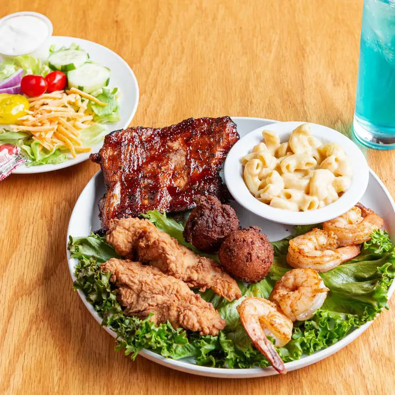 Southern platter with ribs, shrimp, mac and cheese