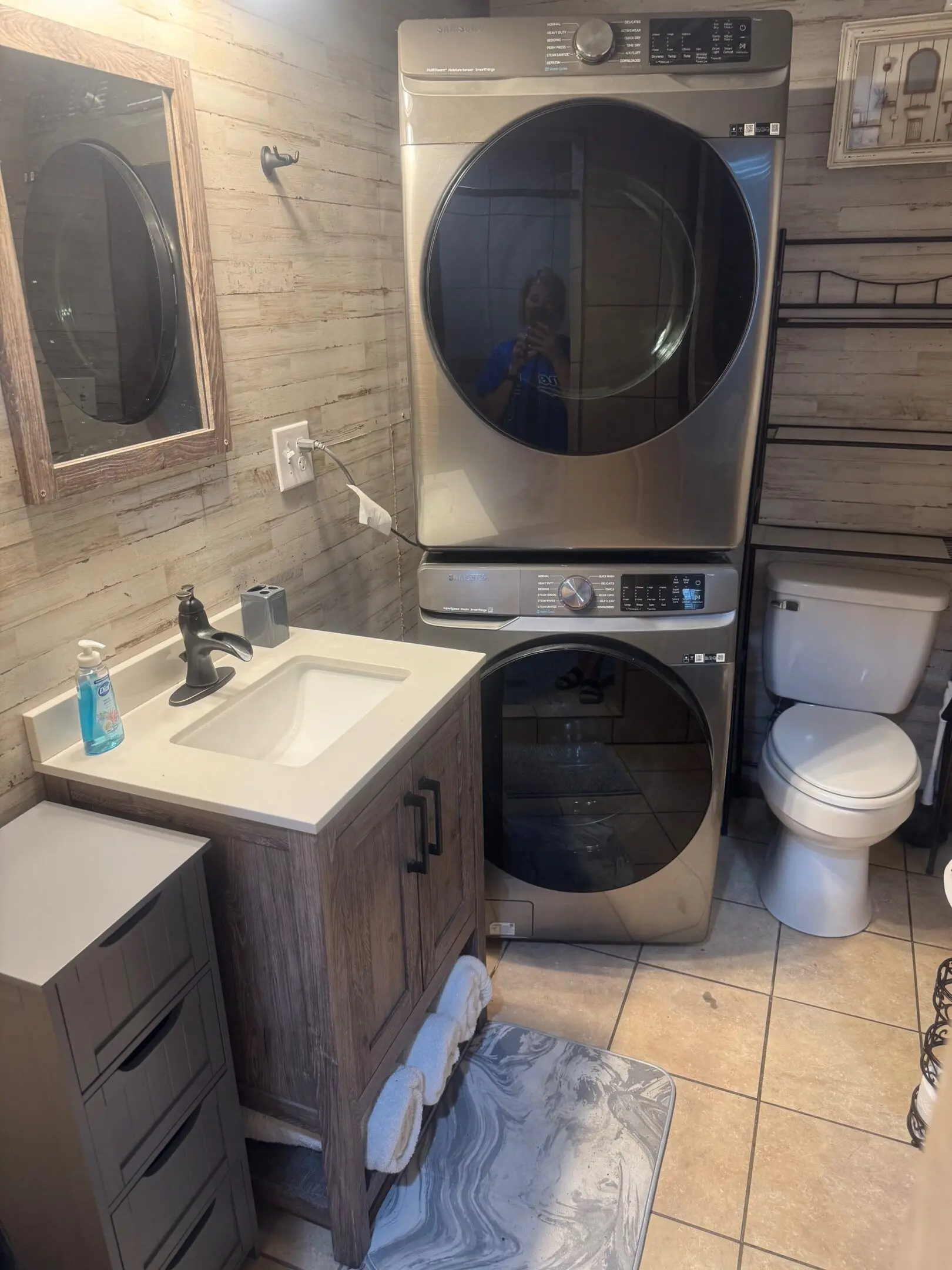 Stacked washer and dryer in bathroom