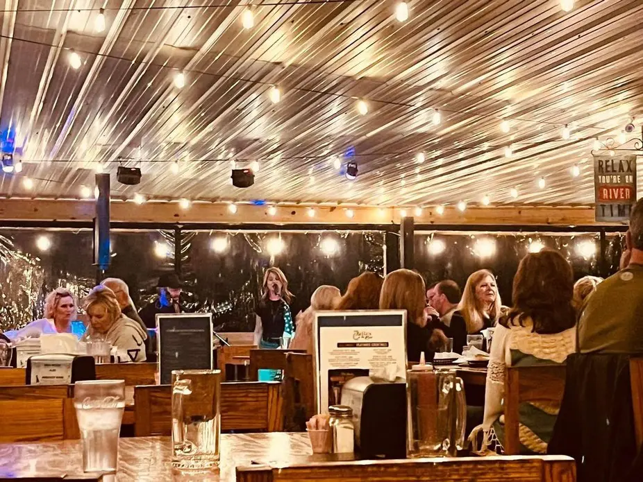 Cozy restaurant patio dining under string lights
